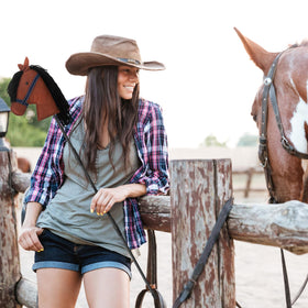 Hushee coffee-colored horse head on a stick for derby day vibes and rustic celebrations.