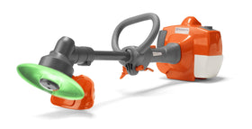 Husqvarna toy trimmer with realistic sounds and lights for imaginative outdoor play