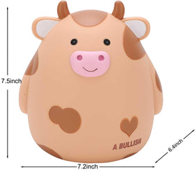 H&W Cow Piggy Bank yellow nursery decor idea for playful learning spaces.