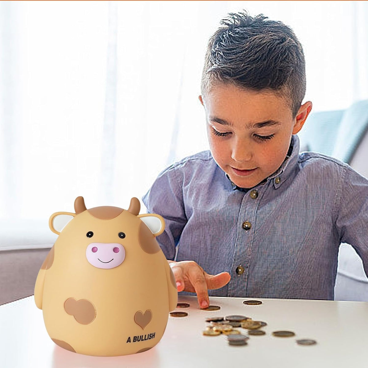 H&W Cow Piggy Bank yellow packaging ready for gift giving.