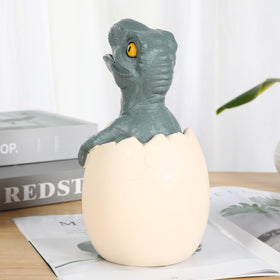 H&W Velociraptor cub piggy bank gift-ready for birthdays and holidays.