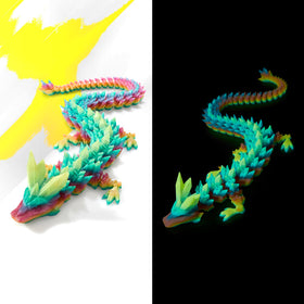 HyBaiS glow-in-the-dark dragon figurine glows softly in dim lighting.