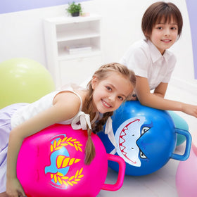 Kids bouncing on Hymaz hopper ball indoors during playtime.