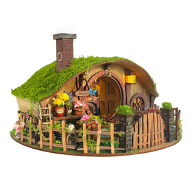 IBOHEYE forest house kit front view shows intricate wood details for mindful crafting