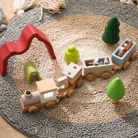 Water-based paint on ibwaae wooden train set provides vibrant color safely.
