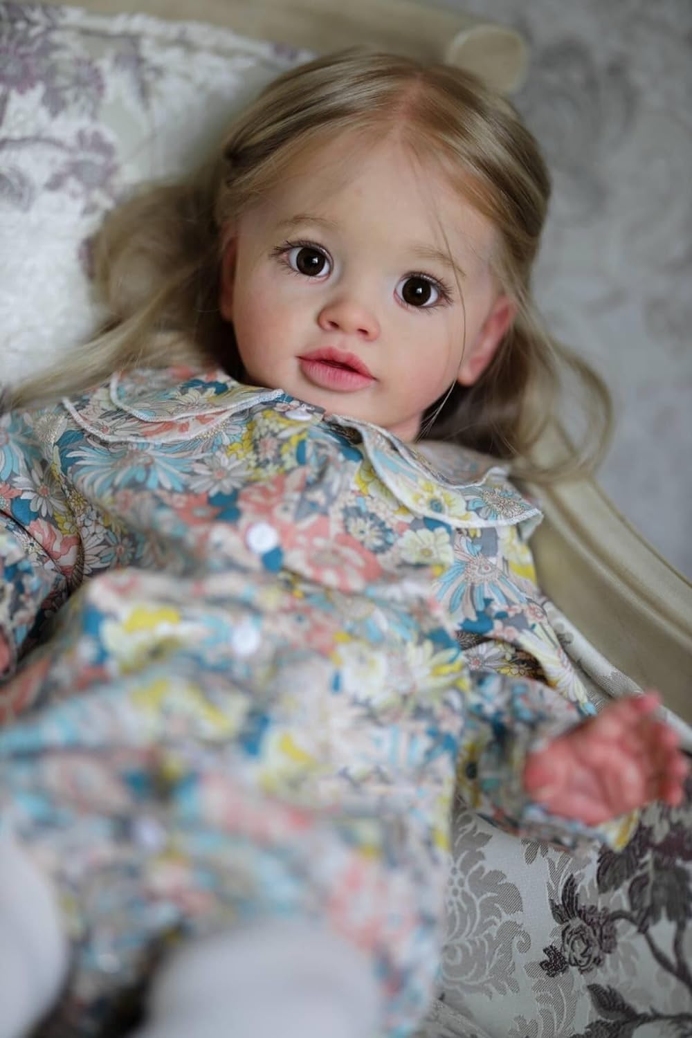iCradle hair and eyelashes close-up on lifelike toddler doll