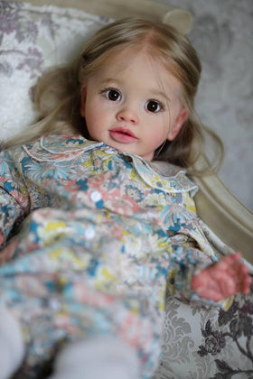 iCradle hair and eyelashes close-up on lifelike toddler doll