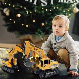ID Gerilla RC excavator ready for outdoor sand play on beach or yard.