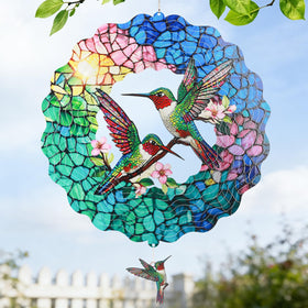 IDEA SHOW hummingbird wind spinner 12in spins gently in a garden for visual calm