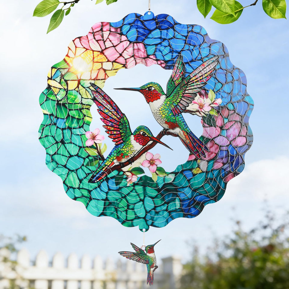 IDEA SHOW hummingbird wind spinner 12in spins gently in a garden for visual calm