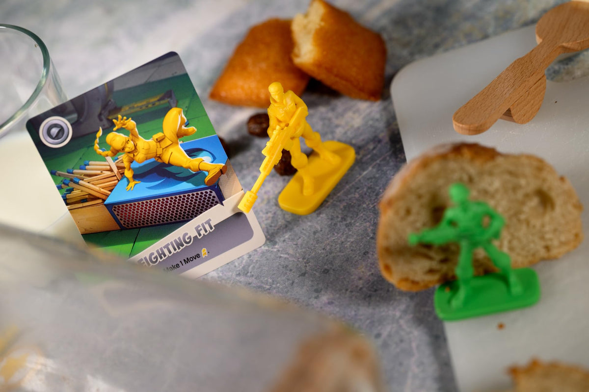 IELLO Little Soldiers compact box with modular scenarios for family play.