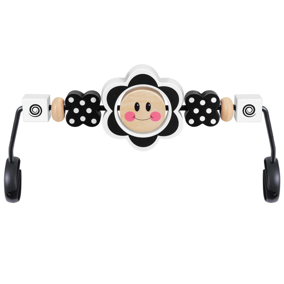 iGRATENS Baby Bjorn Bouncer Toy Bar with black and white flowers boosts early visual tracking.