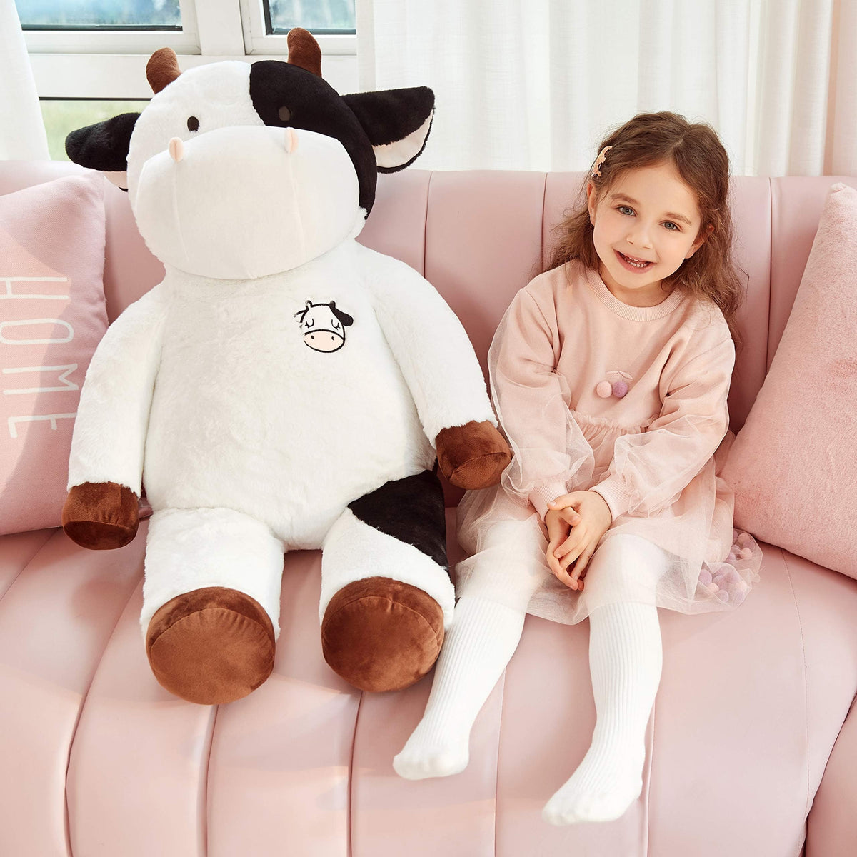 IKASA giant cow care image highlighting surface-washable design.