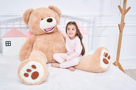 IKASA giant teddy bear safety label close-up emphasizes EN71 and ASTM compliance.