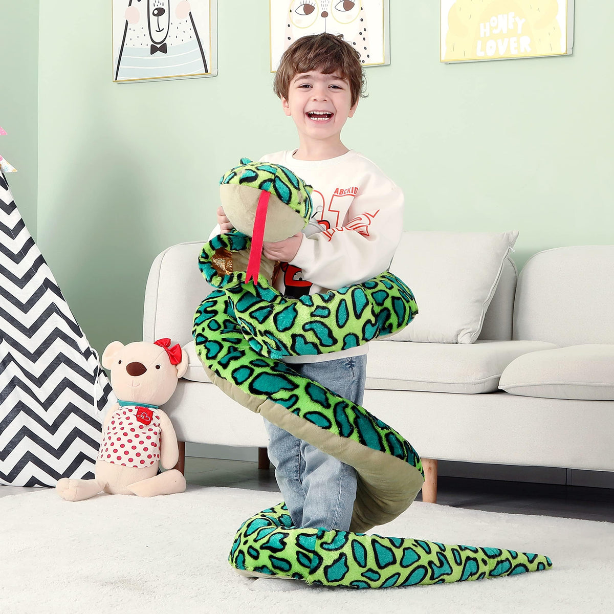 IKASA kid-friendly giant snake plush for cozy hugs and comforting companionship.