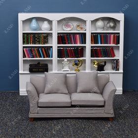 iland dollhouse couch khaki drills back view shows compact footprint and sleek silhouette
