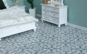 iLAND tile close-up highlights fine print and Rococo detail