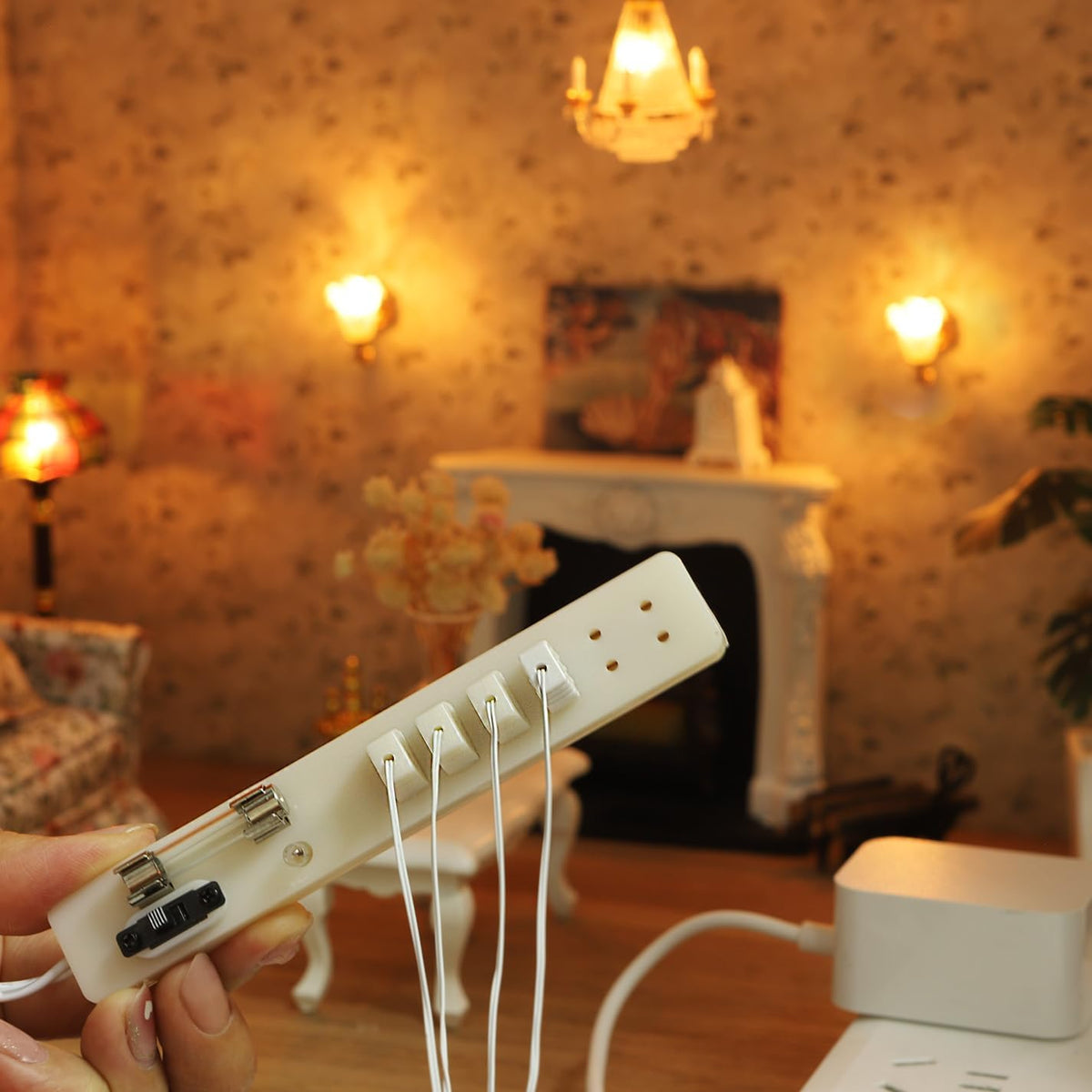 iLAND dollhouse power strip switch for easy control of miniature lighting.