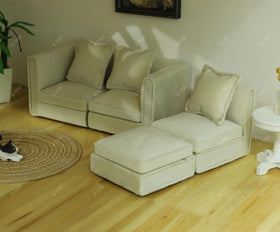 iland handmade miniature couch craftsmanship highlighting stitching and shape.