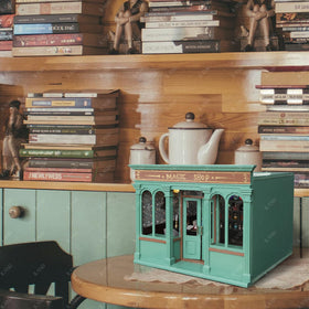 iland Roof ivy accents add rustic charm to the dollhouse.