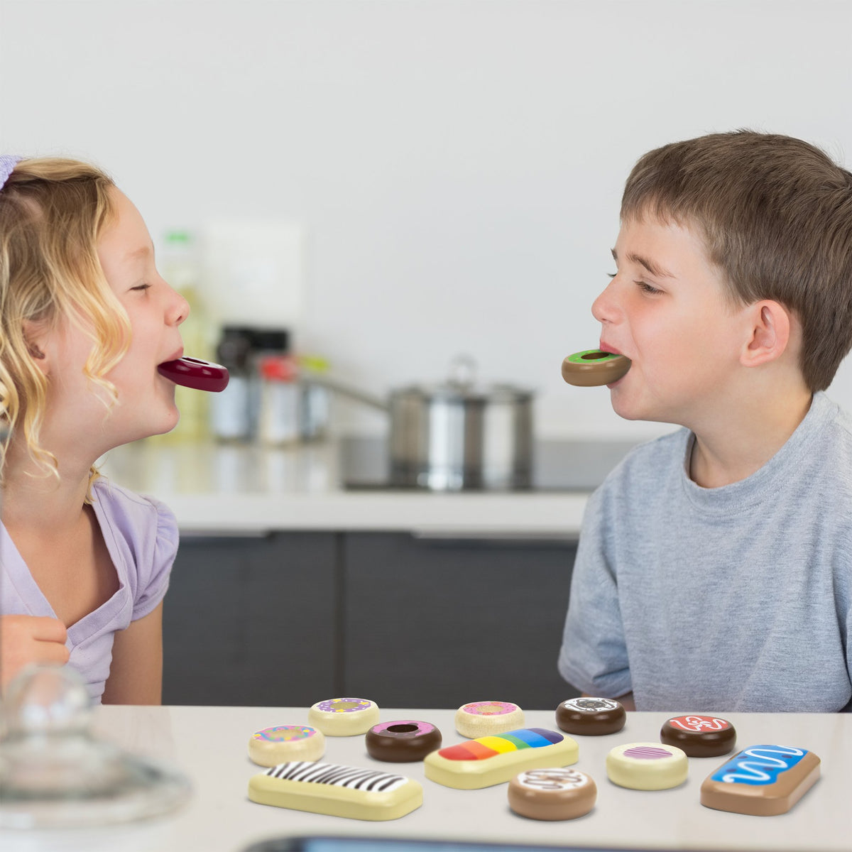 Kids engage with Imagination Generation wooden donuts for imaginative play
