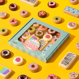 Three long john wooden donuts from Imagination Generation set for pretend kitchen