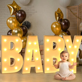 Imprsv 3 ft tall letters illuminate events with warm yellow glow.