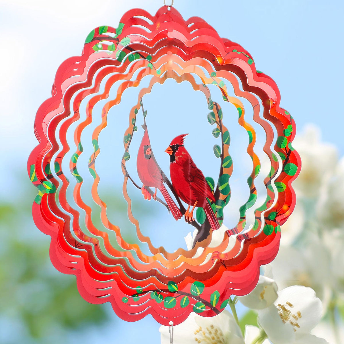 INCROYDAY Cardinal Wind Spinner in a sunny garden enhances yard aesthetics with dynamic movement