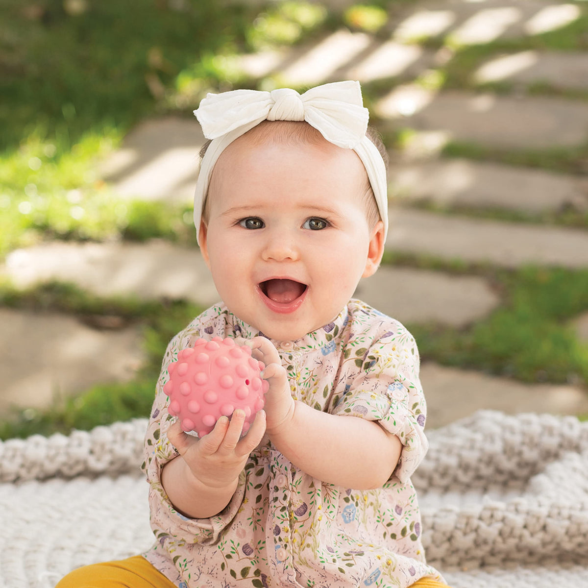Bright, colorful Infantino balls to captivate babies during play.