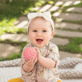 Bright, colorful Infantino balls to captivate babies during play.