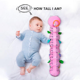 Infinno Baby Caterpillar pink close-up showcasing soft textures and diverse fabrics.
