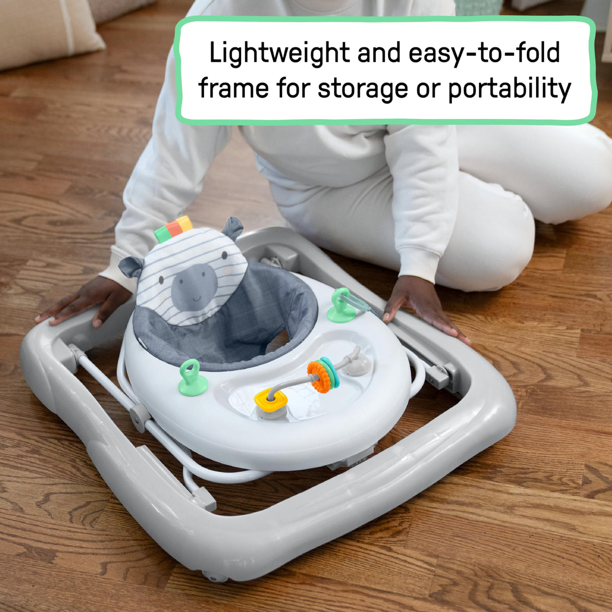 Removable, machine-washable seat pad simplifies cleaning after play sessions.