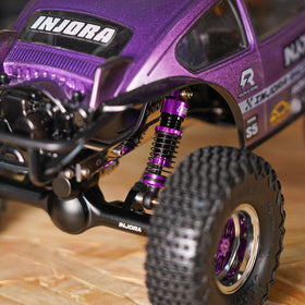 INJORA shock damper assembly with bladder seals