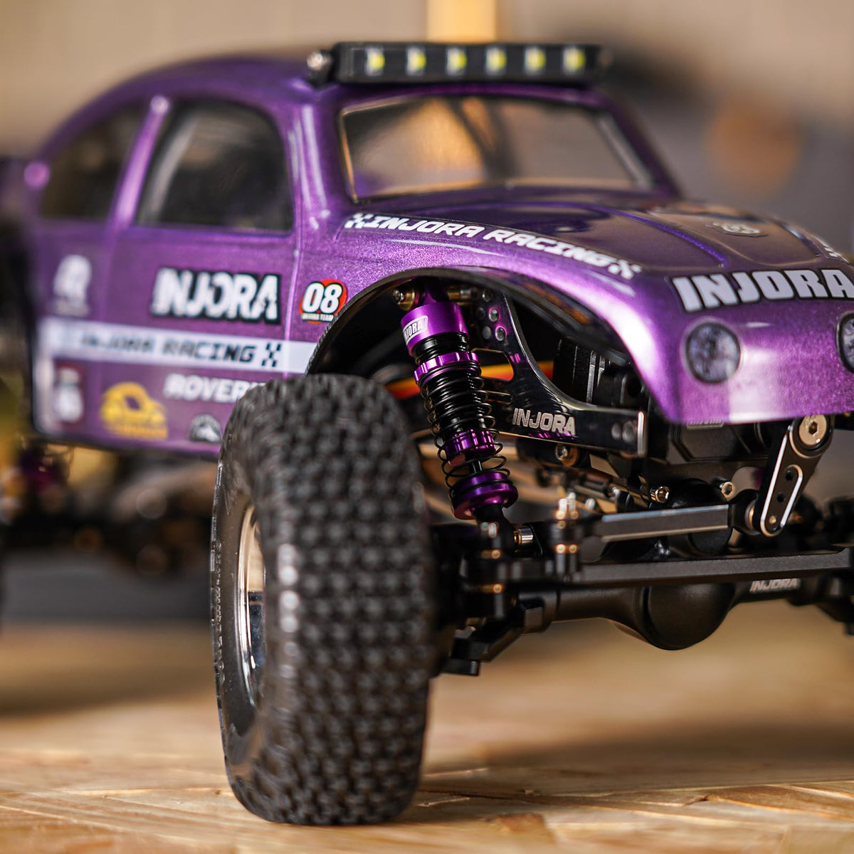 INJORA big bore shock installed on a 1/24 chassis