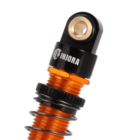INJORA 45mm shocks gold top view highlighting compact design.