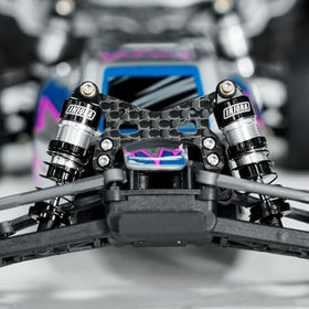 INJORA aluminum oil shocks package content including extra springs.