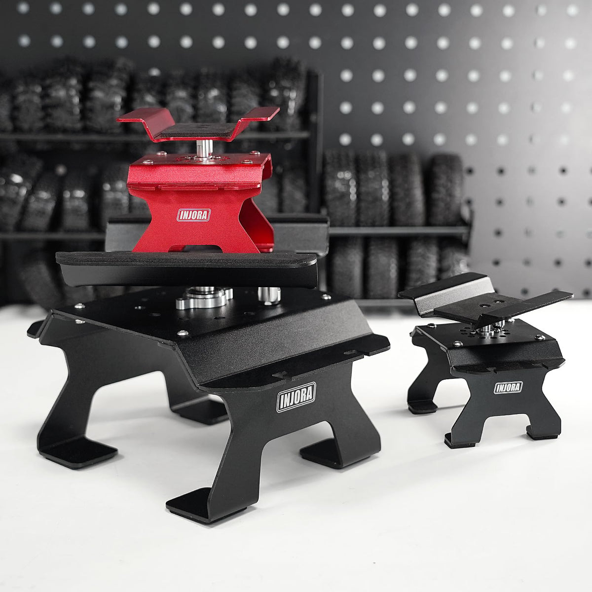 INJORA aluminum stand black anodized finish for durability.