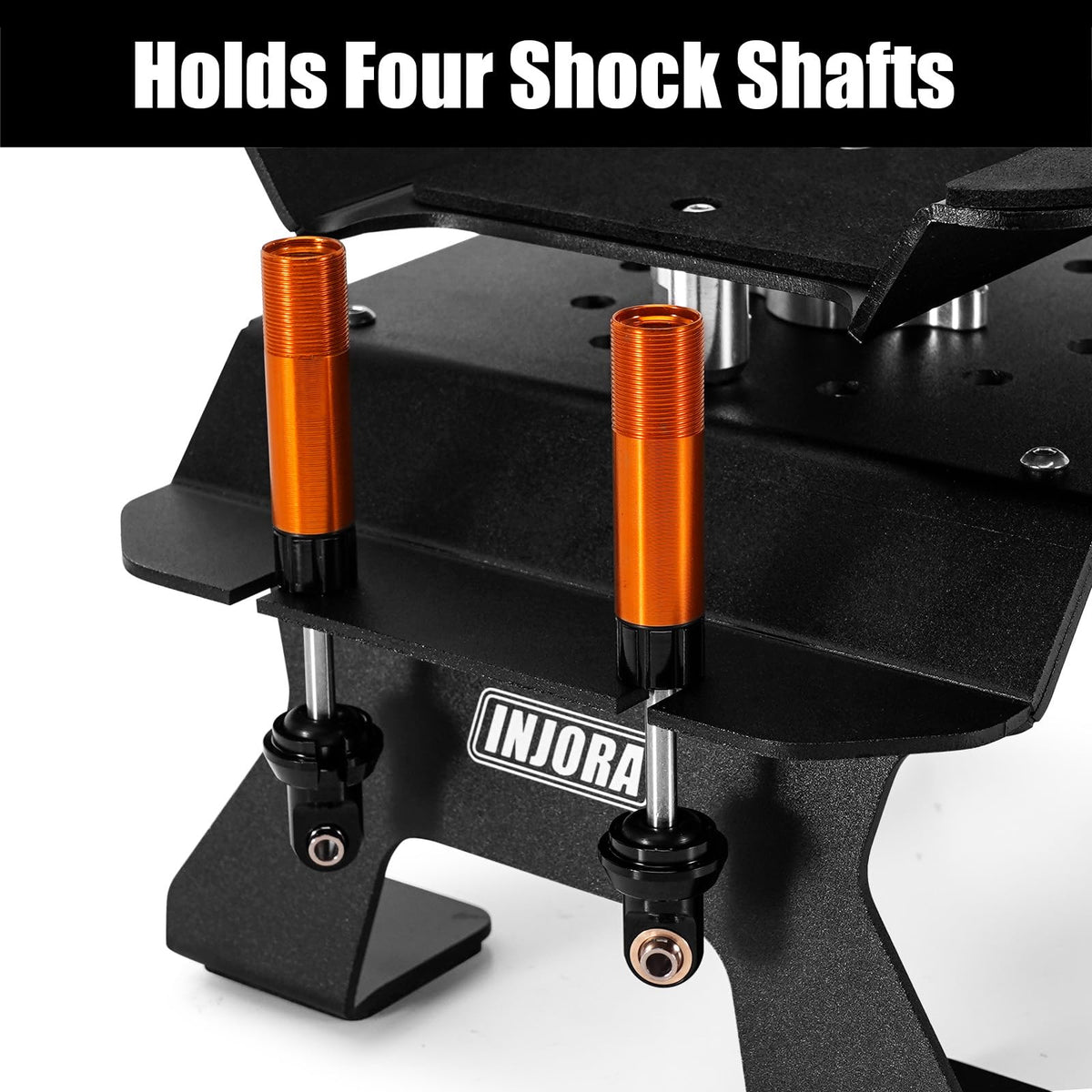 INJORA aluminum stand shock-holder keeps four shafts aligned.