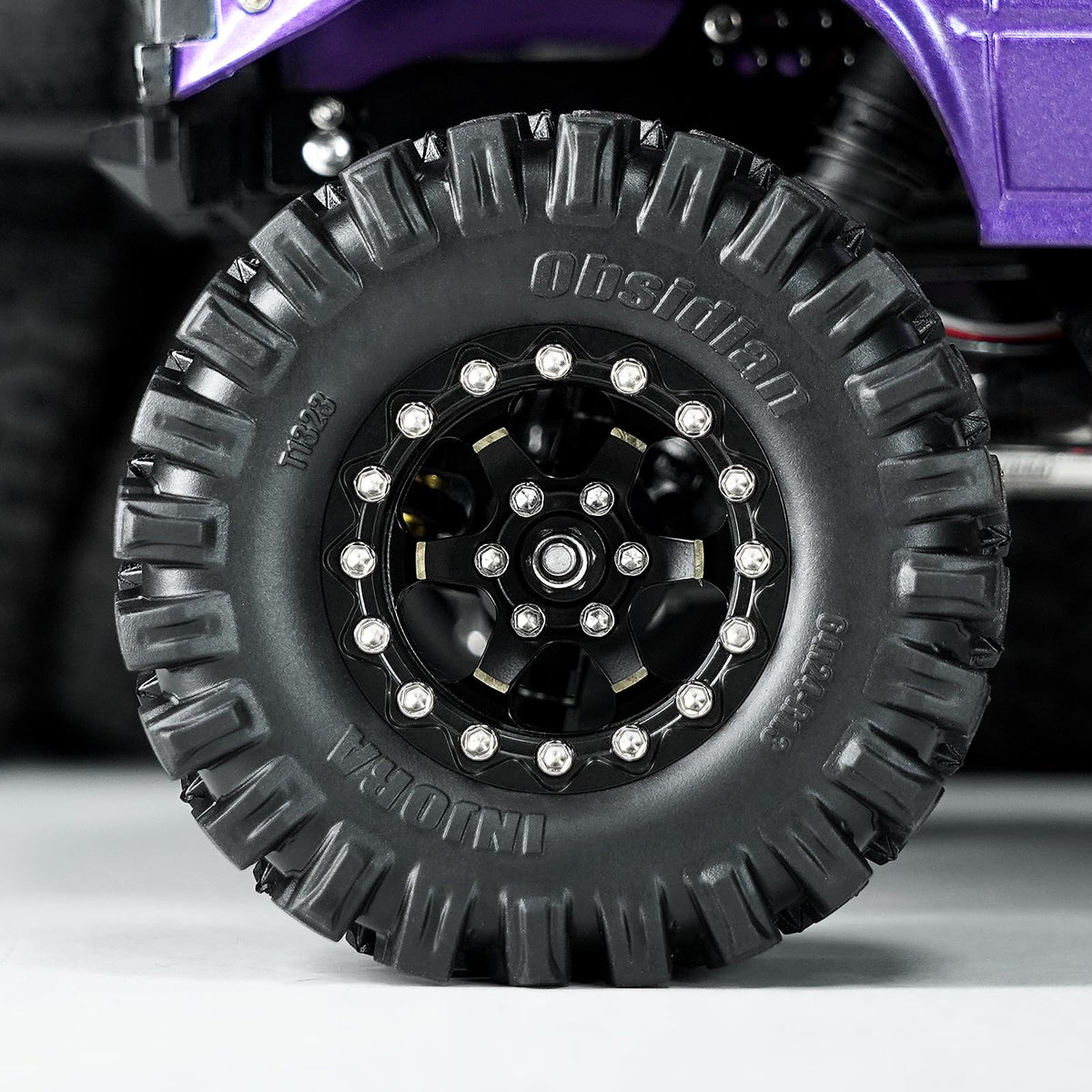 INJORA beadlock wheel 1.3-inch black brass pack shows four-wheel set