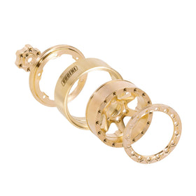 INJORA brass beadlock wheel with 6-spoke design for rugged terrain aesthetics and performance.