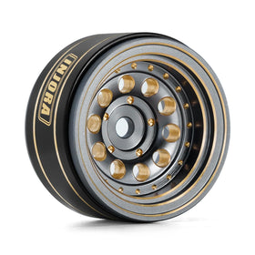 Side view of INJORA beadlock rim showing black finish and brass core for stability.