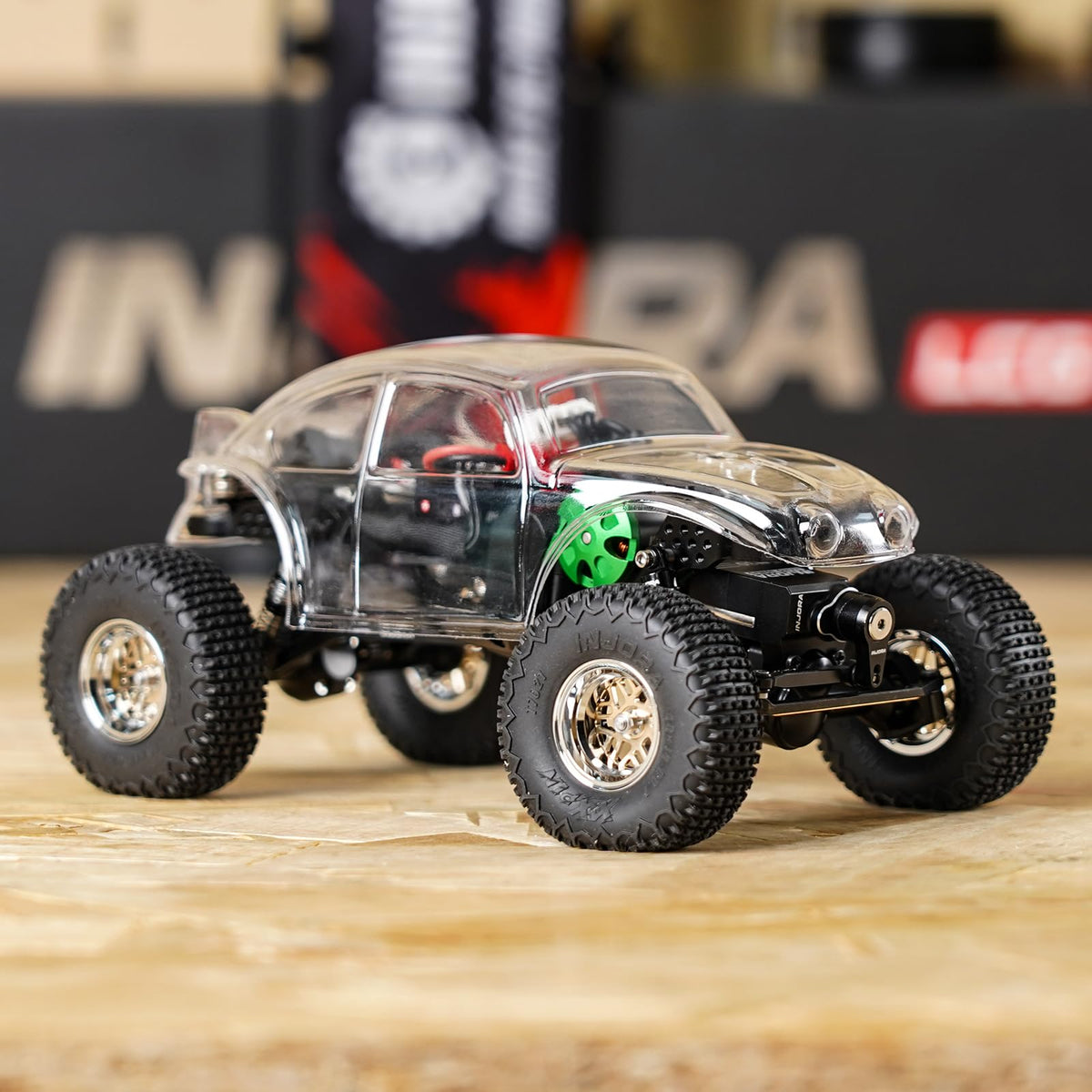 INJORA Bug30 package contents: shell, mount, stickers, and manual.