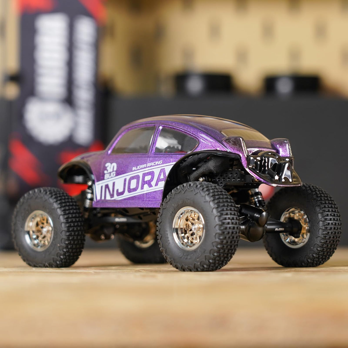 INJORA BUG30 packaging includes body shell, mount, stickers, and manual