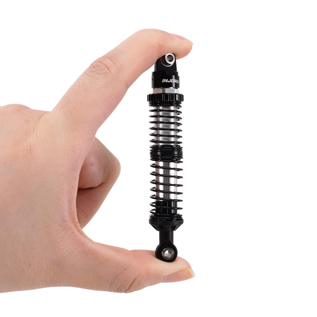 INJORA DRX 120mm dual-rate shocks package includes springs for quick setup.