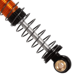 Shocks installed on FCX24 illustrate upgraded travel and stability.