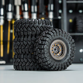 INJORA grey RC crawler set shown on rugged terrain for durable performance.