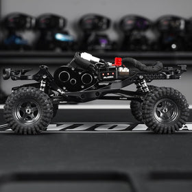 INJORA LCG aluminum chassis climbing setup demonstrates stability on inclines