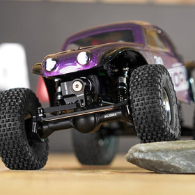 INJORA plus3mm planet axles U-joint front shafts enable smooth articulation.