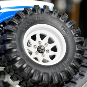 INJORA RC crawler wheel in white ready for upgrade and enhanced handling.
