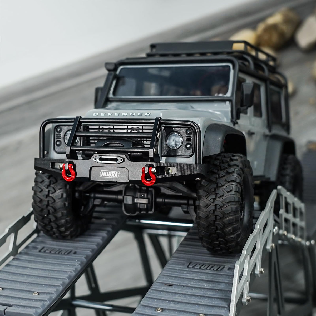 INJORA rear bumper weighs 26g to keep rear weight in check.